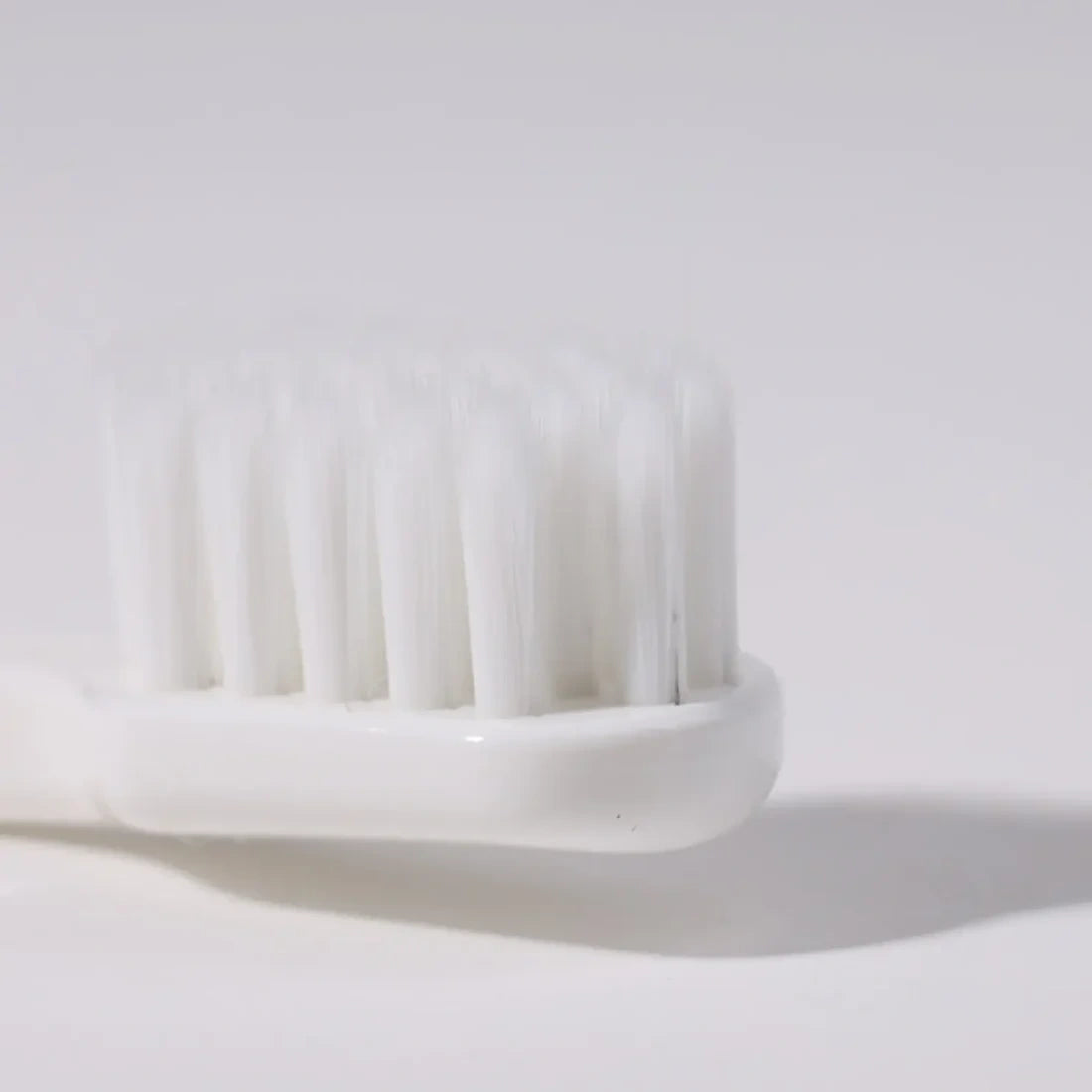 ITO Toothbrush. Premium toothbrush with dense bristles and a precision-shaped head