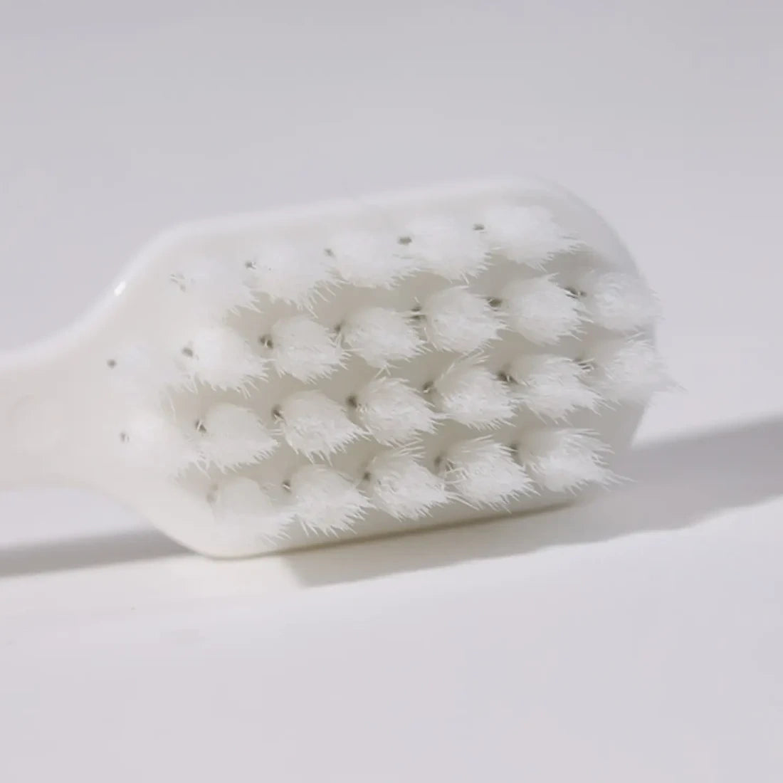 ITO Toothbrush. Premium toothbrush with dense bristles and a precision-shaped head